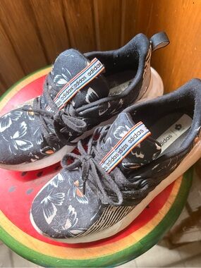 FARM Rio Black Floral Athletic Sneakers with White & Orange Accents